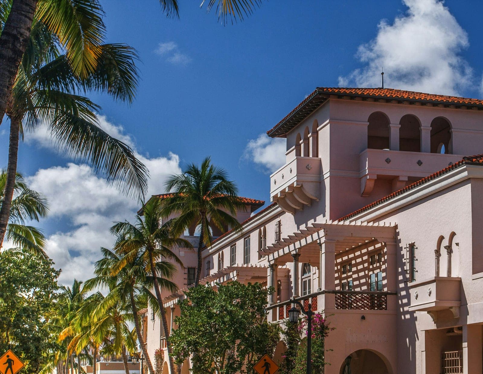 Mediterranean Revival arches and palms in Palm Beach
