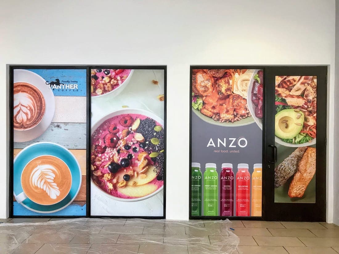 Full-color food photography printed on storefront windows