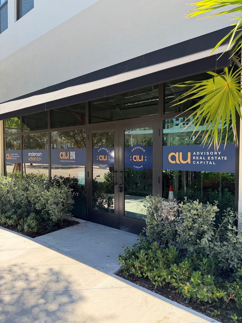 Window vinyl across a real estate capital firm's storefront