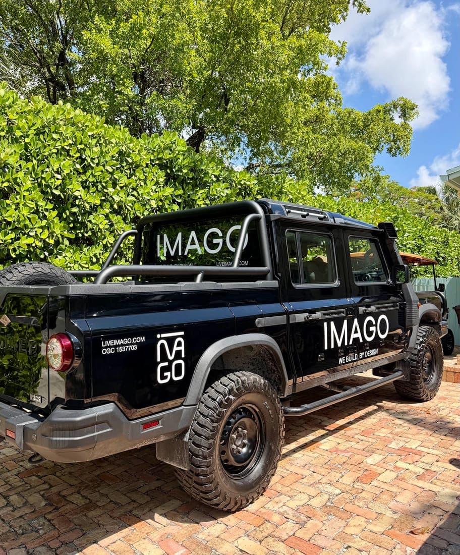 Black pickup truck with white cut-vinyl fleet graphics